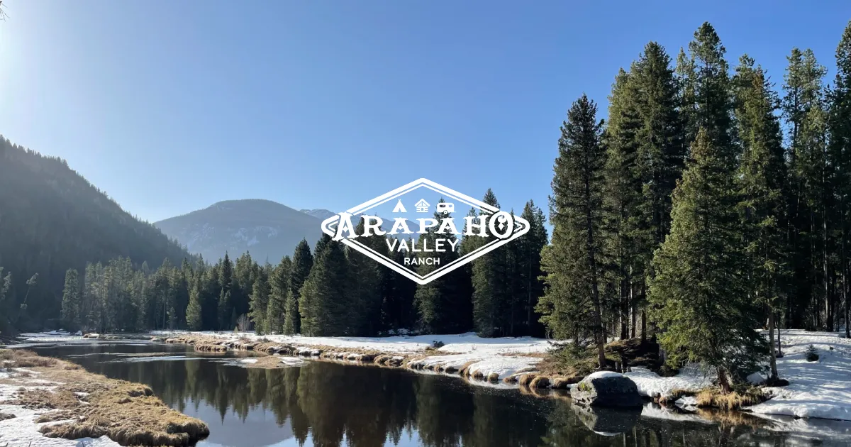 Arapaho Valley Ranch logo, snowy forest, mountains, and river