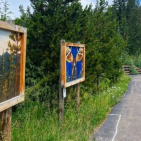 Winter Park logo, Rendezvous Colorado logo, scenic outdoor trail with paintings
